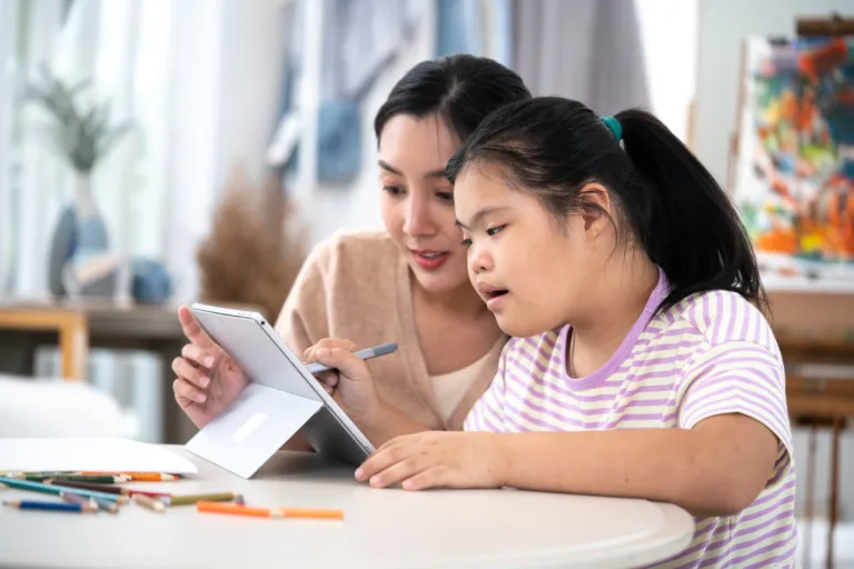 Professional psychologist working with autistic girl in her office,Education