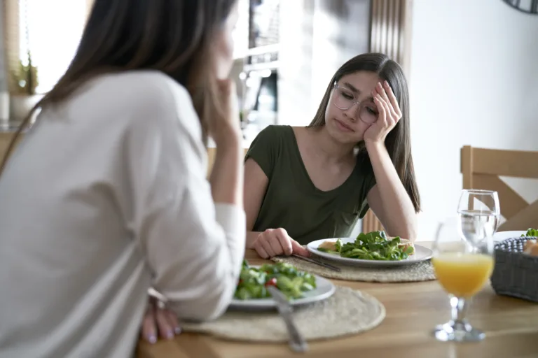 Caucasian woman support her daughter with eating disorders