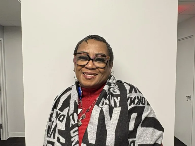 RBT Tina standing against a white wall